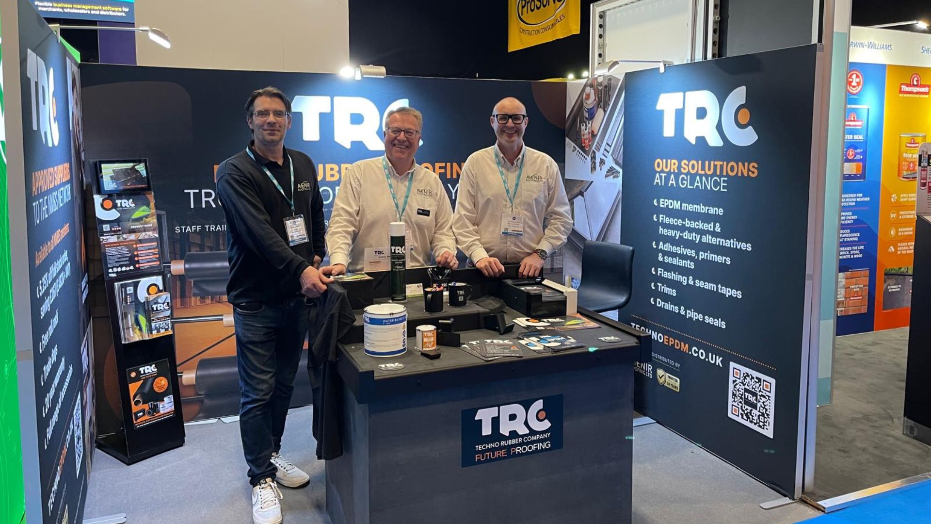Three members of the Avenir Roofing Ltd, Adrian, Phil and Duncan, at their stand designed by Flamingo Marketing Strategies for the NMBS Exhibition 2026.