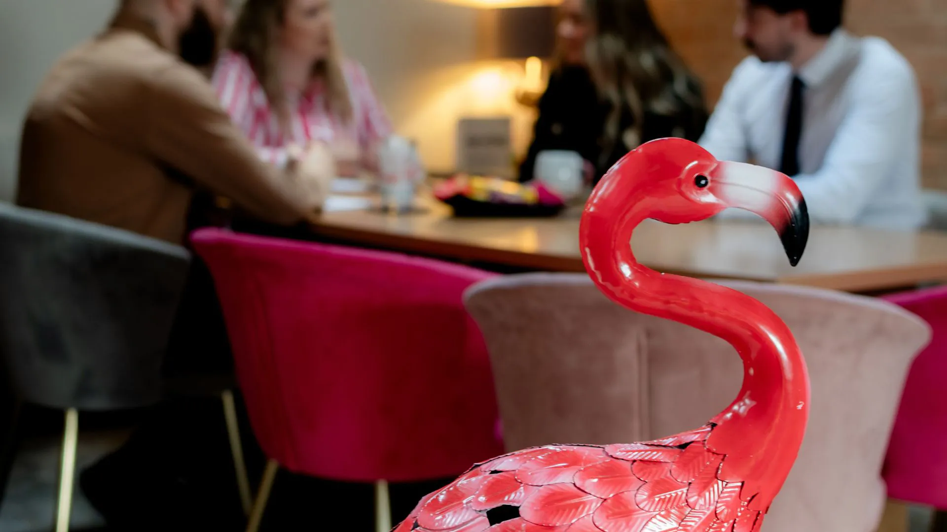 Flamingo-Team Flamingo sculpture in marketing meeting room